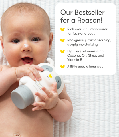 Baby holding a Bubbsi Whipped Coconut Oil Body Cream bottle with product features listed on the right.