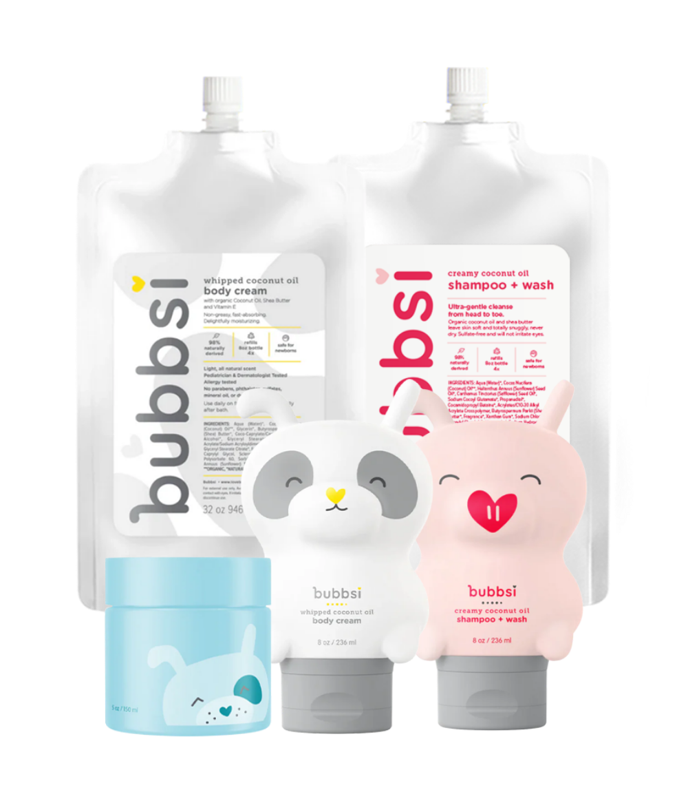 Collection of bubbsi baby products including body cream, shampoo & wash, and oil balm on a transparent background.